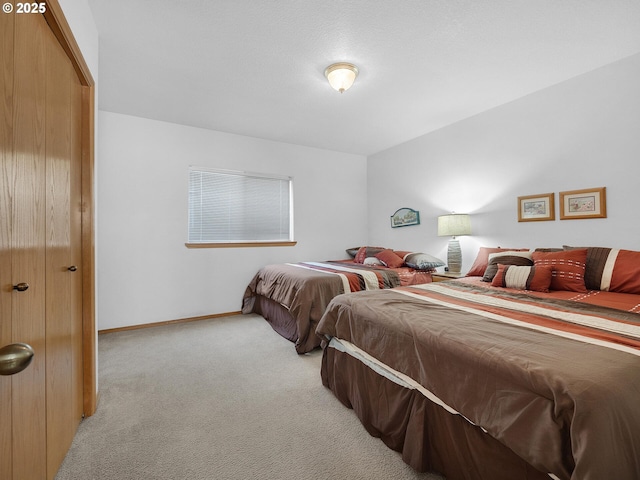 370 4th Pl, Manzanita, OR 97130 - bedroom with carpet flooring and baseboards
