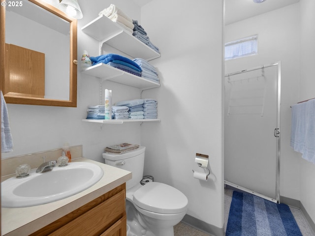 370 4th Pl, Manzanita, OR 97130 - bathroom featuring vanity, toilet, and a stall shower