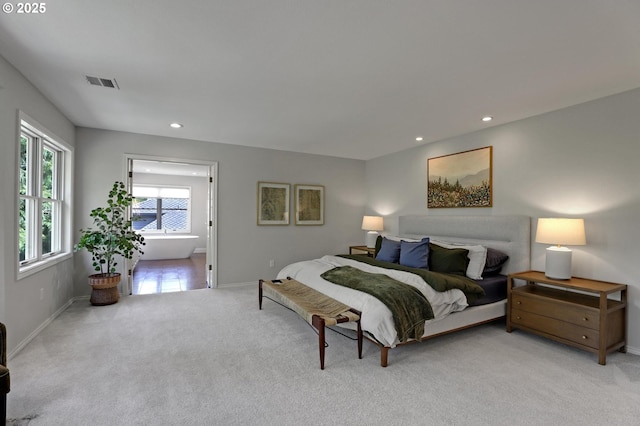 bedroom with carpet floors, recessed lighting, baseboards, and visible vents