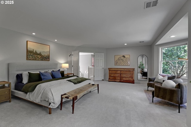 bedroom with visible vents, recessed lighting, and carpet