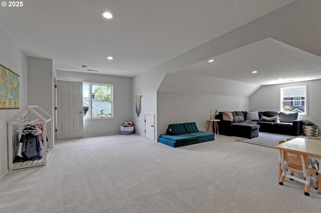living room featuring recessed lighting and carpet