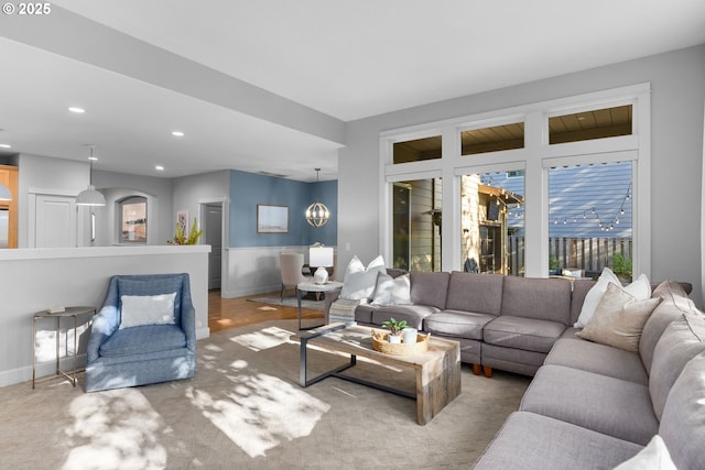 18287 SW Florendo Ln, Beaverton, OR 97007 - carpeted living room with recessed lighting and baseboards