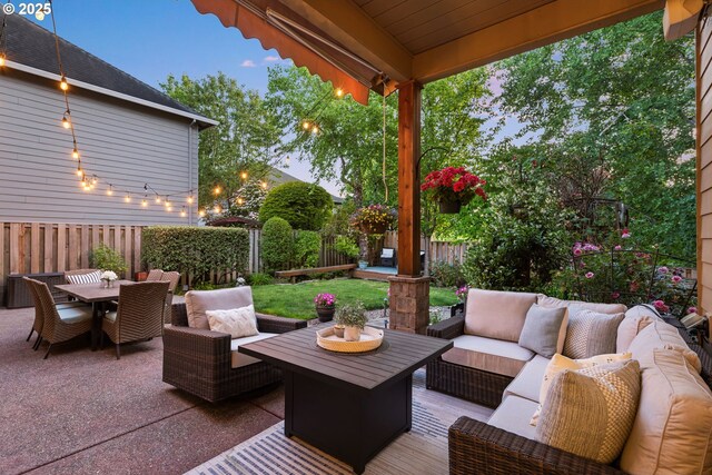 18287 SW Florendo Ln, Beaverton, OR 97007 - fenced backyard with an outdoor living space, outdoor dining area, and a patio