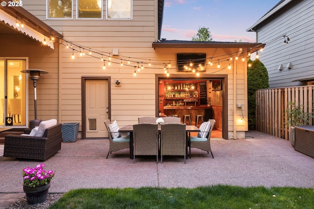 18287 SW Florendo Ln, Beaverton, OR 97007 - patio terrace at dusk featuring a patio area and outdoor dining space