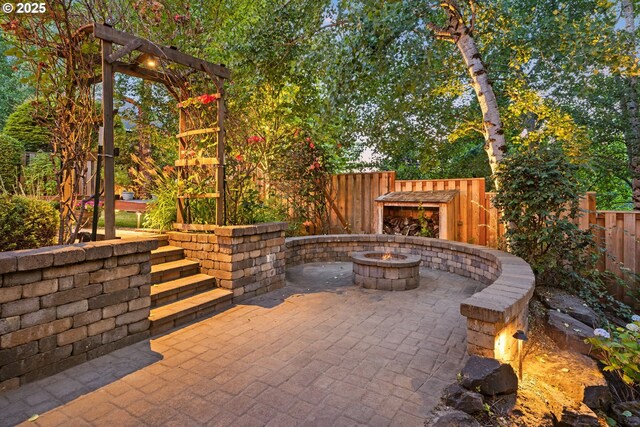 18287 SW Florendo Ln, Beaverton, OR 97007 - view of patio / terrace with an outdoor fire pit