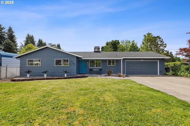 721 NW 76th St, Vancouver, WA 98665 - ranch-style home with a garage, a chimney, and driveway