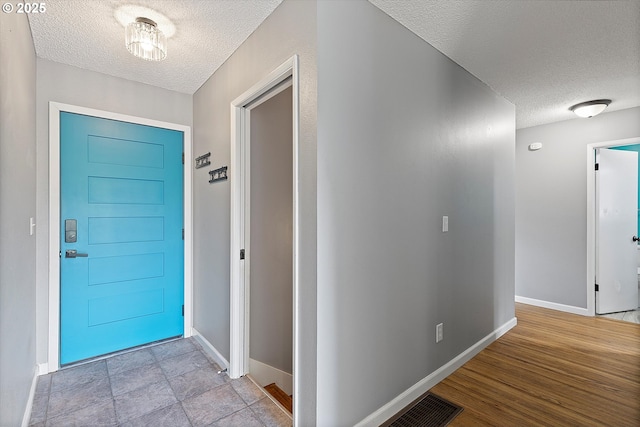 721 NW 76th St, Vancouver, WA 98665 - entryway with a textured ceiling and baseboards