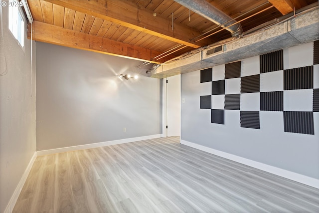 721 NW 76th St, Vancouver, WA 98665 - unfurnished room with wood ceiling with exposed beams, wood finished floors, and baseboards