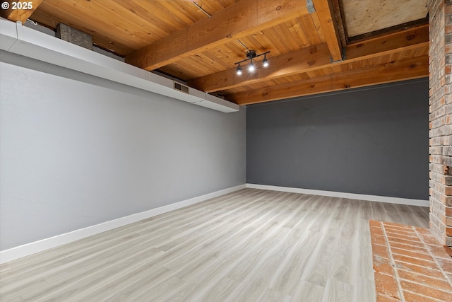 721 NW 76th St, Vancouver, WA 98665 - unfurnished room featuring wood finished floors, wood ceiling with exposed beams, and baseboards