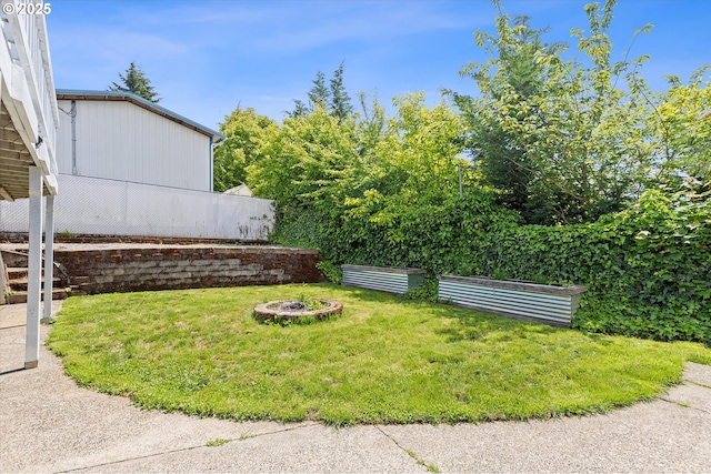 721 NW 76th St, Vancouver, WA 98665 - view of green lawn featuring a fire pit