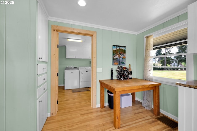 35478 Brabham Rd, Pleasant Hill, OR 97455 - hallway with crown molding, washing machine and dryer, light wood-style flooring, and baseboards