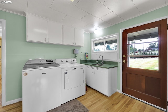 35478 Brabham Rd, Pleasant Hill, OR 97455 - laundry room with cabinet space, crown molding, independent washer and dryer, and light wood-style flooring