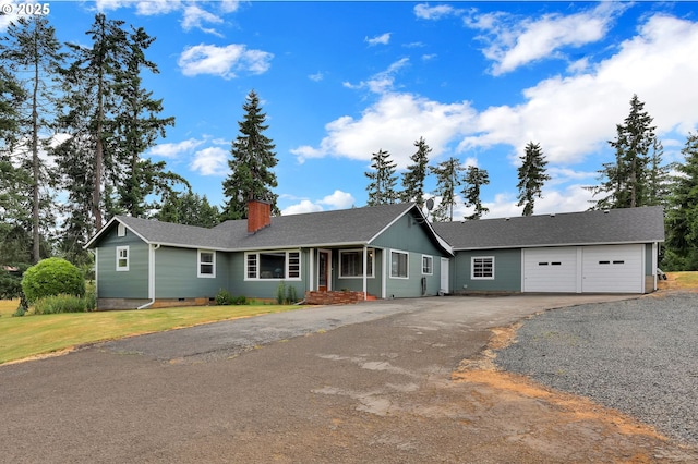 35478 Brabham Rd, Pleasant Hill, OR 97455 - single story home with asphalt driveway, a chimney, an attached garage, roof with shingles, and a front yard
