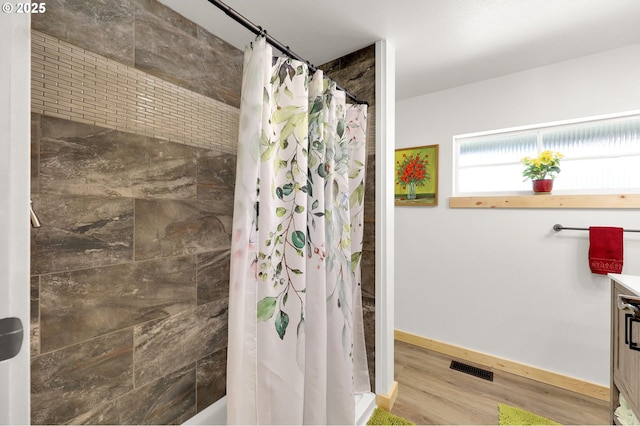 35478 Brabham Rd, Pleasant Hill, OR 97455 - full bath featuring wood finished floors, vanity, baseboards, and shower / bath combination with curtain