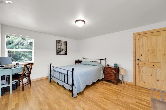 35478 Brabham Rd, Pleasant Hill, OR 97455 - bedroom featuring light wood finished floors, baseboards, and a desk
