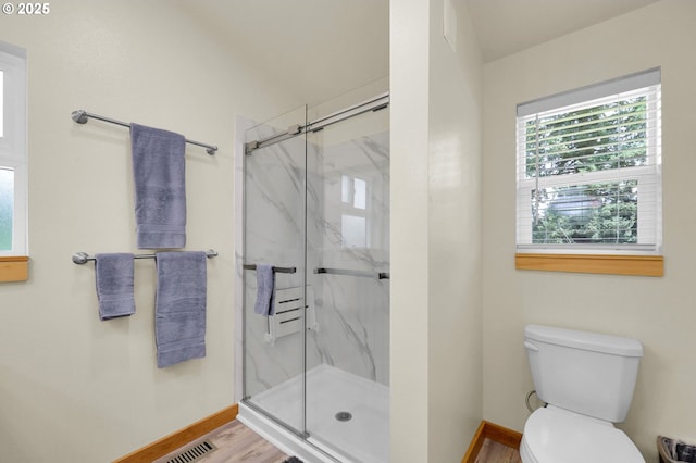 35478 Brabham Rd, Pleasant Hill, OR 97455 - bathroom with baseboards, a marble finish shower, toilet, and wood finished floors