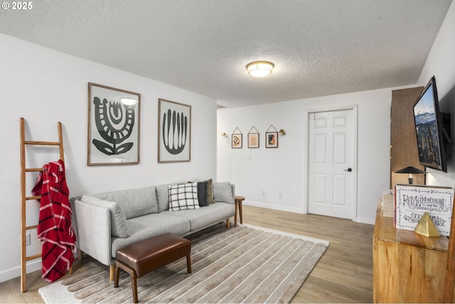 1001 S Grant St, Canby, OR 97013 - living room featuring a textured ceiling and wood finished floors