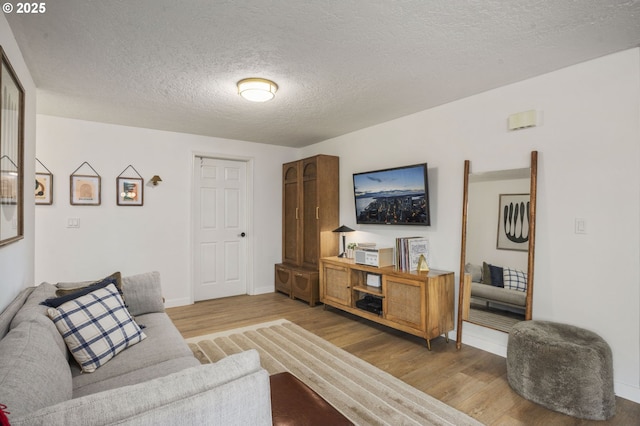 1001 S Grant St, Canby, OR 97013 - living room with wood finished floors and a textured ceiling