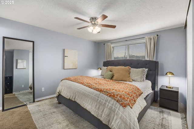 1001 S Grant St, Canby, OR 97013 - carpeted bedroom featuring a textured ceiling and ceiling fan