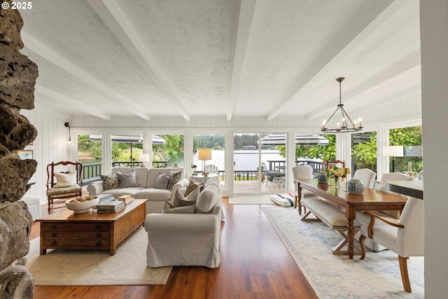 1667 Lake Front Rd, Lake Oswego, OR 97034 - sunroom / solarium with beam ceiling, a chandelier, and a water view