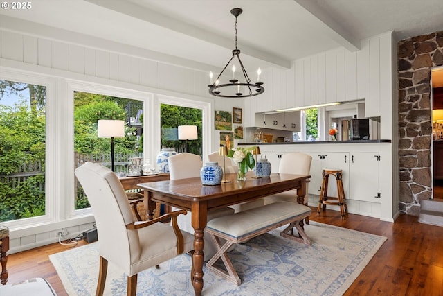 1667 Lake Front Rd, Lake Oswego, OR 97034 - dining area with a chandelier, beamed ceiling, and dark wood-style flooring