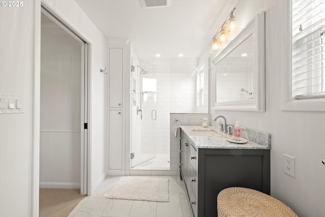 1667 Lake Front Rd, Lake Oswego, OR 97034 - full bathroom featuring vanity, a stall shower, marble look tiles, and recessed lighting