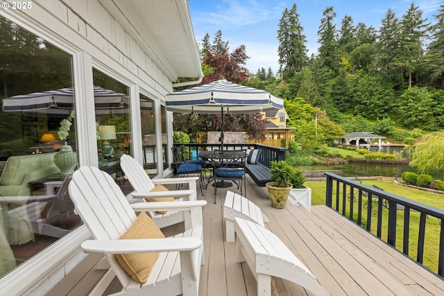 1667 Lake Front Rd, Lake Oswego, OR 97034 - wooden terrace with outdoor dining space and a yard