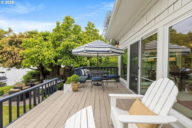 1667 Lake Front Rd, Lake Oswego, OR 97034 - wooden terrace featuring a water view and outdoor dining area
