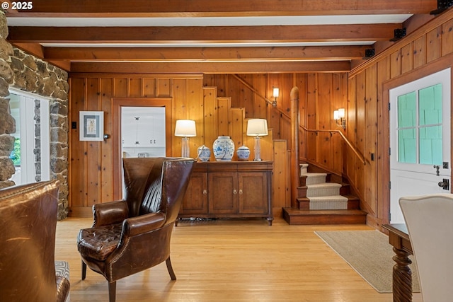 1667 Lake Front Rd, Lake Oswego, OR 97034 - living room with beam ceiling, stairway, light wood finished floors, and wooden walls