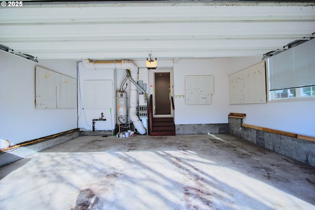 garage with strapped water heater