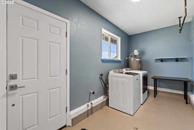 1050 D St, Baker City, OR 97814 - washroom featuring water heater, independent washer and dryer, and a textured ceiling