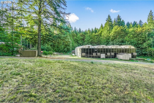 19330 NW Curtis Creek Dr, Manning, OR 97125 - view of green lawn with a wooded view