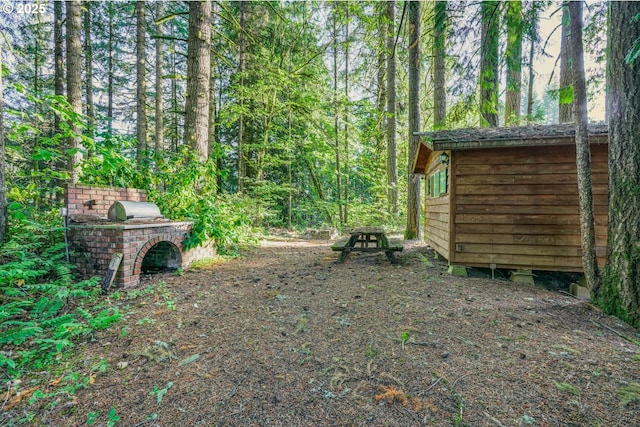 19330 NW Curtis Creek Dr, Manning, OR 97125 - view of yard featuring a forest view and an outbuilding