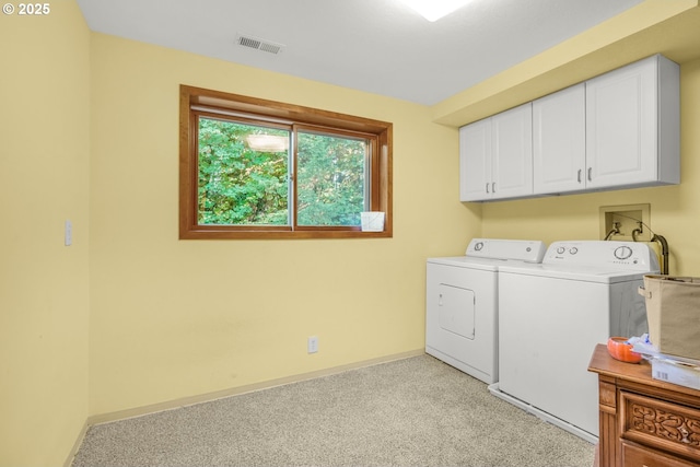 19330 NW Curtis Creek Dr, Manning, OR 97125 - washroom with washing machine and dryer, cabinet space, baseboards, and light carpet