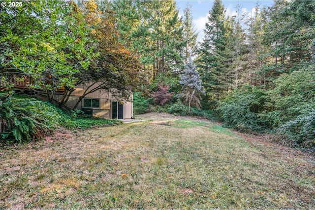 19330 NW Curtis Creek Dr, Manning, OR 97125 - view of green lawn featuring a wooded view