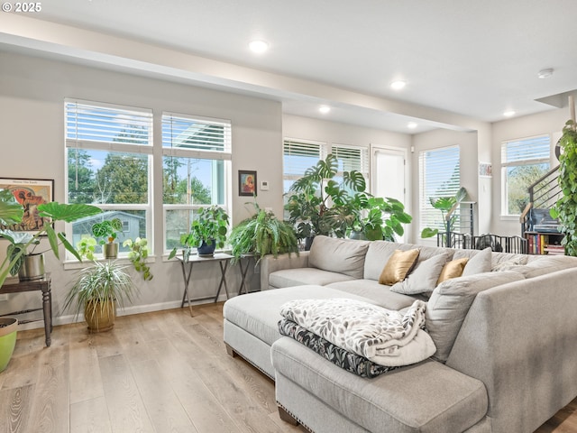 living room with light hardwood / wood-style flooring