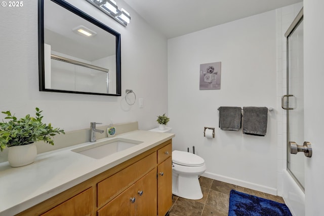 2435 Skyline Blvd, Eugene, OR 97403 - bathroom featuring toilet, vanity, and baseboards