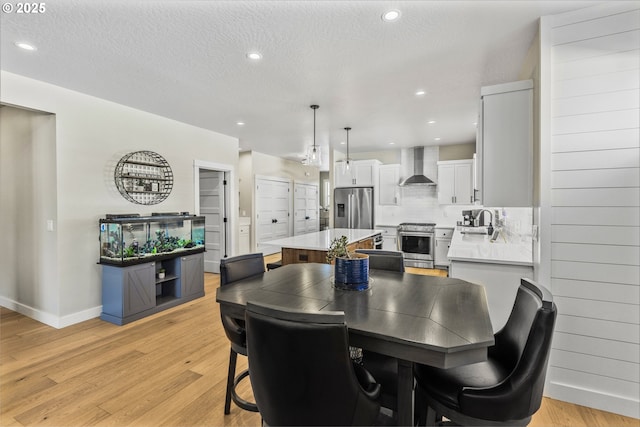 32750 Macy St, Eugene, OR 97408 - dining space with light wood-style flooring and recessed lighting