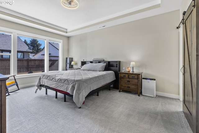 32750 Macy St, Eugene, OR 97408 - bedroom featuring a tray ceiling, carpet floors, and a barn door