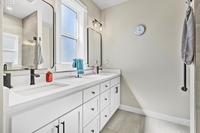 32750 Macy St, Eugene, OR 97408 - full bath featuring double vanity, healthy amount of natural light, a tile shower, and tile patterned floors