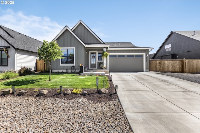 32750 Macy St, Eugene, OR 97408 - view of front facade featuring board and batten siding, a garage, and concrete driveway