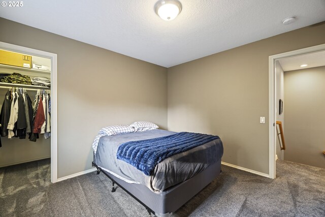 22647 SW Saunders Dr, Sherwood, OR 97140 - carpeted bedroom featuring baseboards and a textured ceiling
