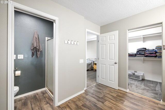 22647 SW Saunders Dr, Sherwood, OR 97140 - bathroom featuring double vanity, a bath, and wood finished floors