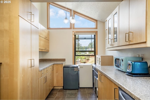 3327 Hillcrest Way, Forest Grove, OR 97116 - kitchen with light brown cabinetry, glass insert cabinets, light countertops, vaulted ceiling, and pendant lighting