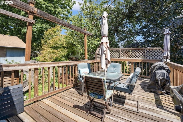 3327 Hillcrest Way, Forest Grove, OR 97116 - deck featuring outdoor dining space and view of wooded area