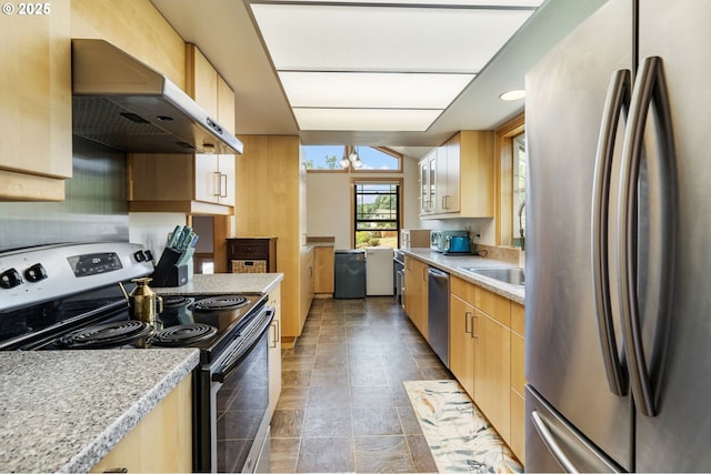 3327 Hillcrest Way, Forest Grove, OR 97116 - kitchen featuring appliances with stainless steel finishes, range hood, light countertops, and light brown cabinetry