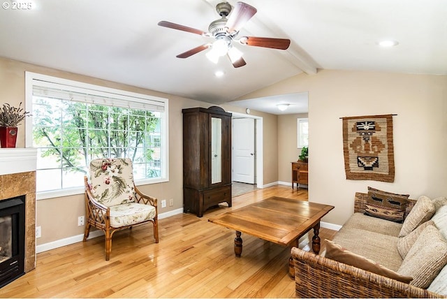 4976 NE K Ave, Neotsu, OR 97364 - kitchen featuring black appliances, brown cabinets, dark countertops, decorative light fixtures, and beam ceiling