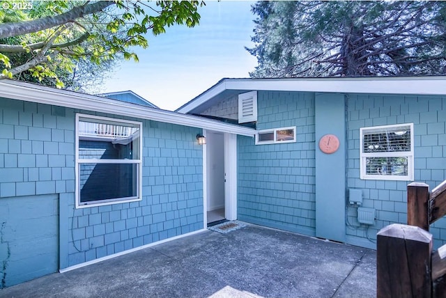 4976 NE K Ave, Neotsu, OR 97364 - view of exterior entry featuring a patio area