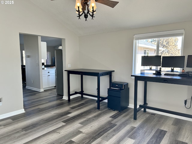 home office with lofted ceiling, ceiling fan, baseboards, and wood finished floors