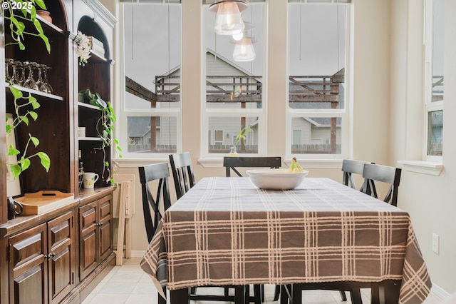 311 W Jadon Dr, Lebanon, OR 97355 - dining room with light tile patterned floors and baseboards
